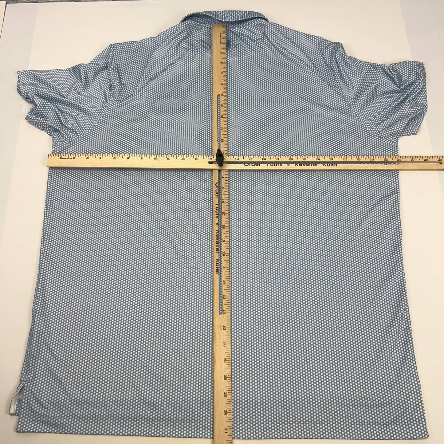 Johnnie-O Polo Shirt in Light Blue, Size Medium, Back View with Measuring Ruler