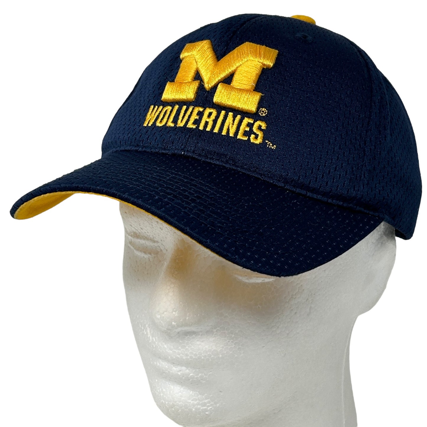 Navy Starter hat featuring yellow Michigan Wolverines logo on the front for sports fans