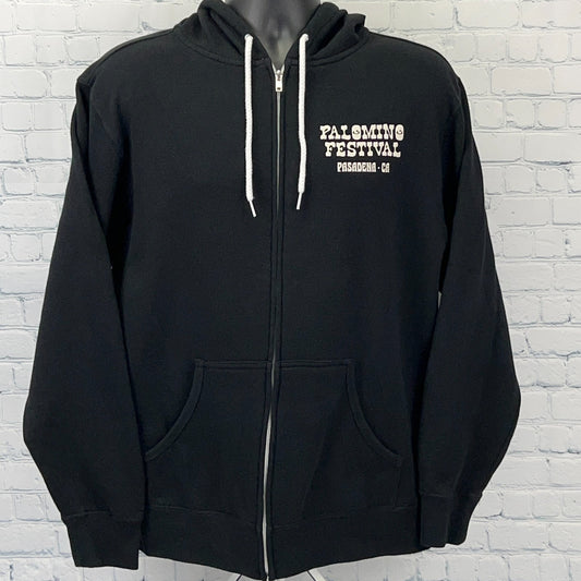 Independent Trading Company black hoodie with Palomino Festival logo featuring willie nelson, front view