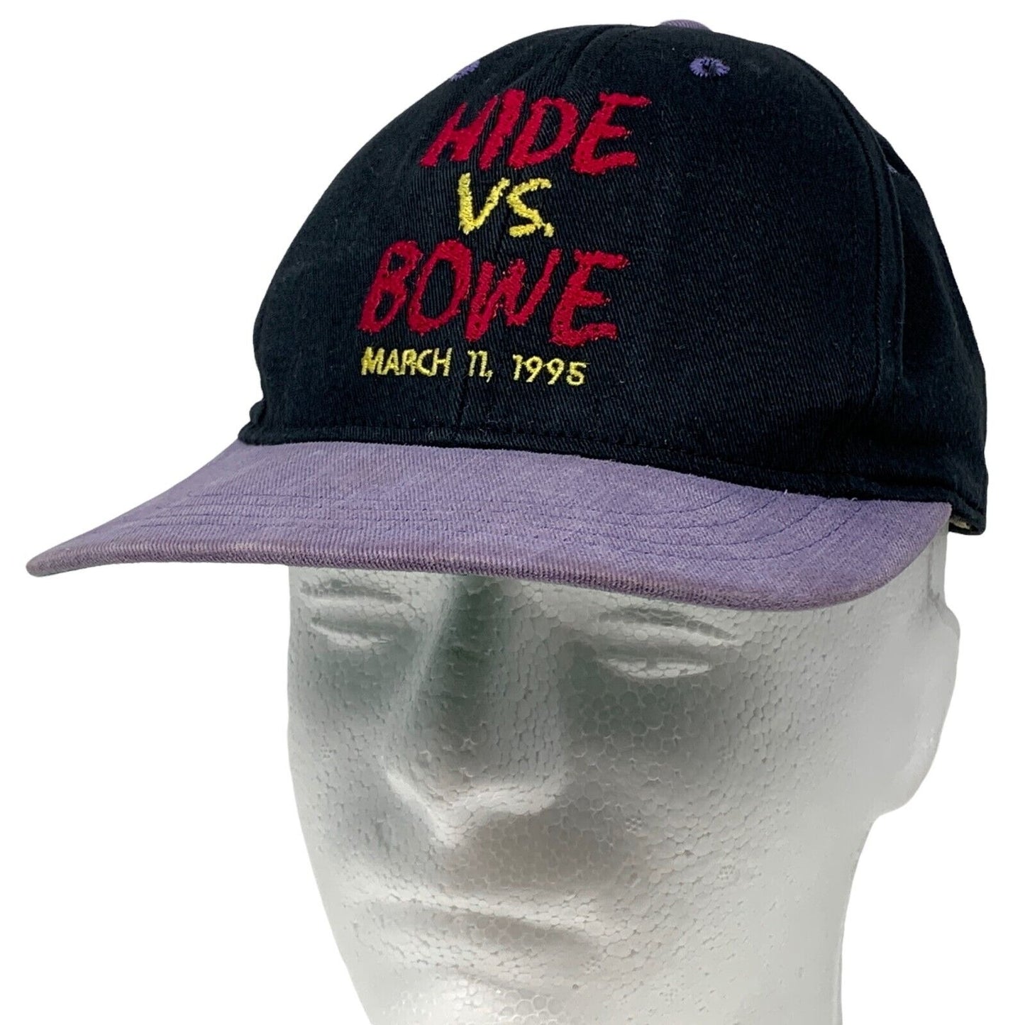 Black Riddick Bowe Herbie Hide hat with colorful embroidery, featuring March 11, 1995 details and a curved brim