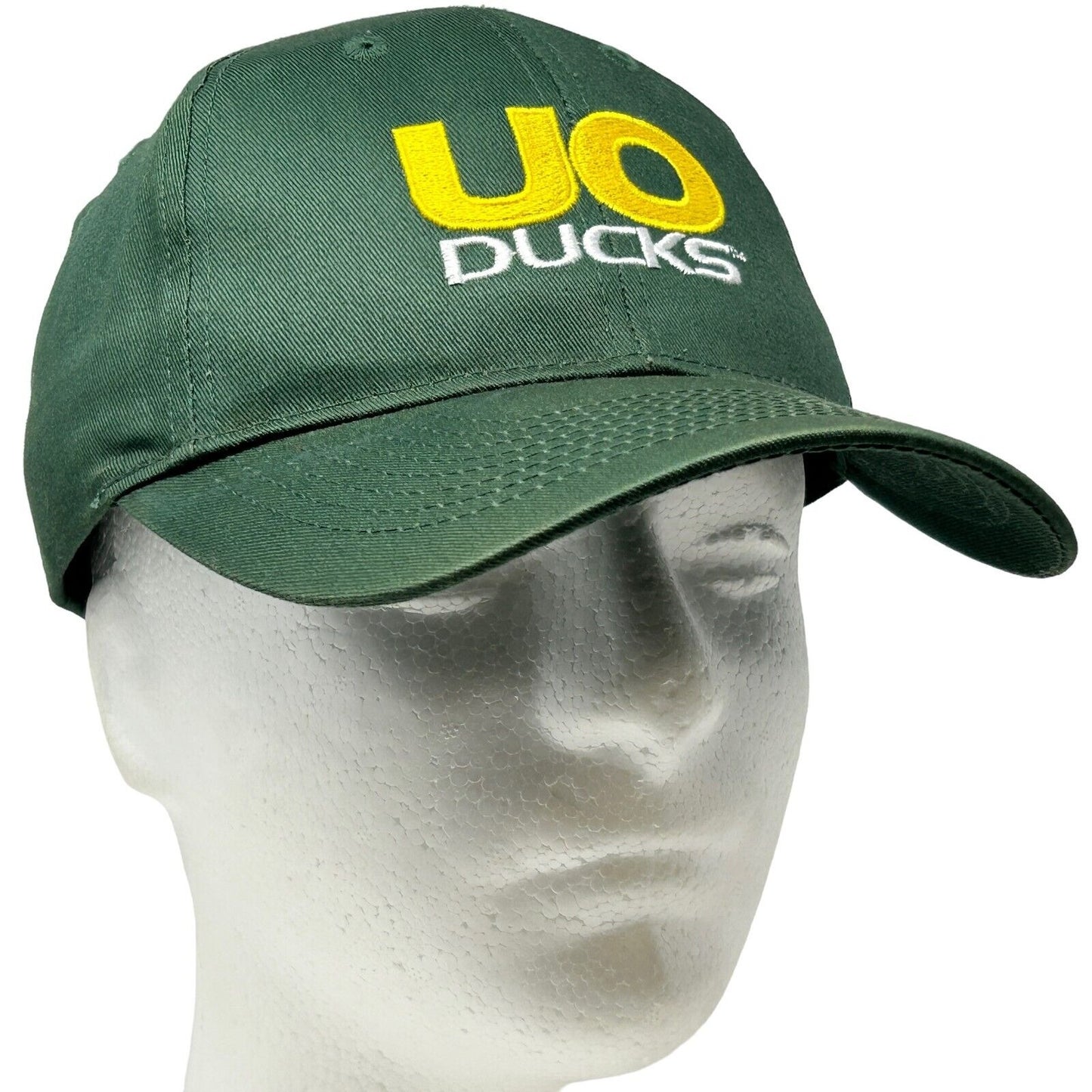 Front view of green University of Oregon Ducks hat featuring UO Ducks logo in yellow