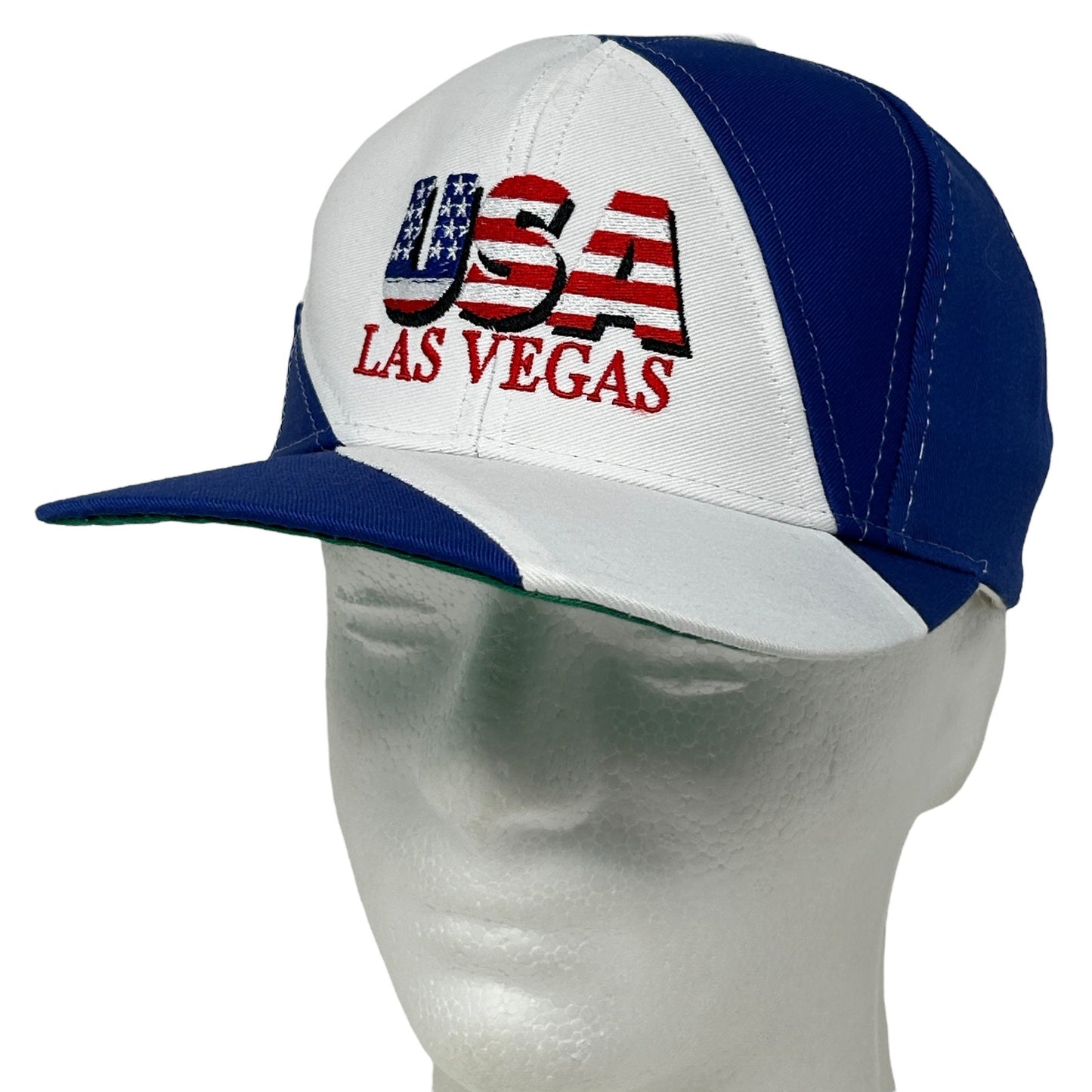 Front view of a blue and white baseball cap with USA Las Vegas embroidered design