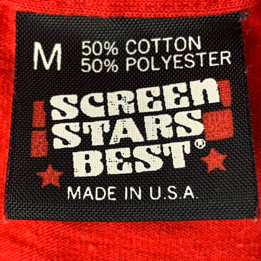Close-up of a vintage Screen Stars t-shirt tag showcasing Screen Stars T-Shirt Tag History from the 1980s