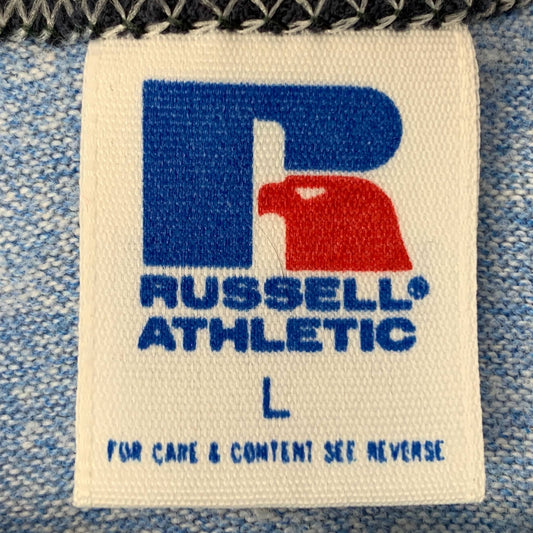 Russell Athletic T-Shirt Tag History featuring a vintage label from the 1980s era