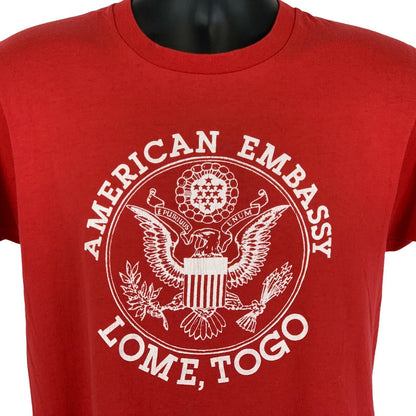 Camiseta vintage de los años 80 de la embajada de Estados Unidos en Lomé, Togo, talla mediana, para hombre, de África y Estados Unidos, color rojo