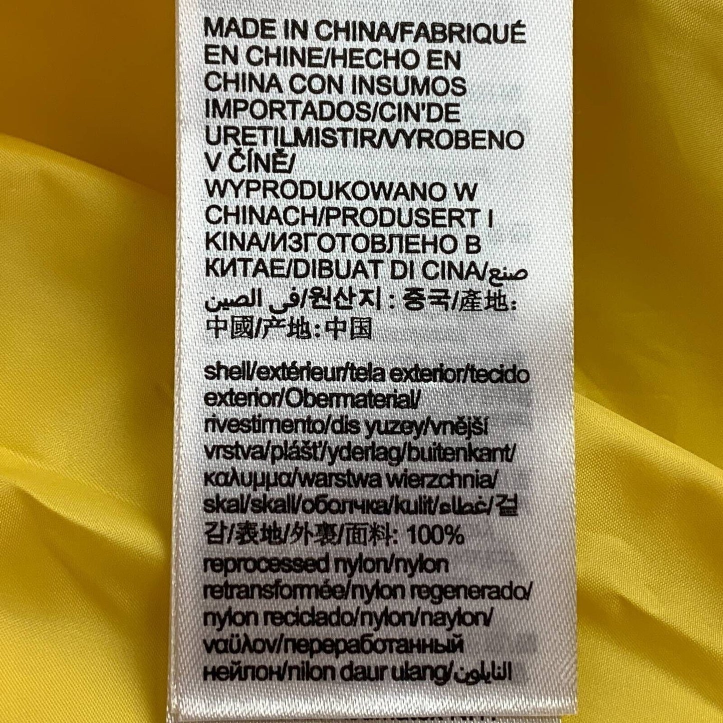 Calvin Klein CK Chaleco Amarillo Hasta la cintura Bolsillos con cremallera Cuello simulado Empacable Pequeño