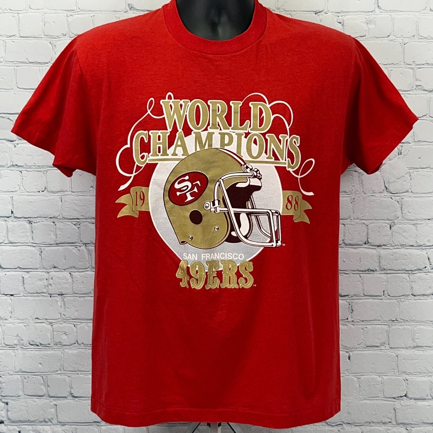 Vintage red t-shirt featuring San Francisco 49ers World Champions graphic, size medium, front view