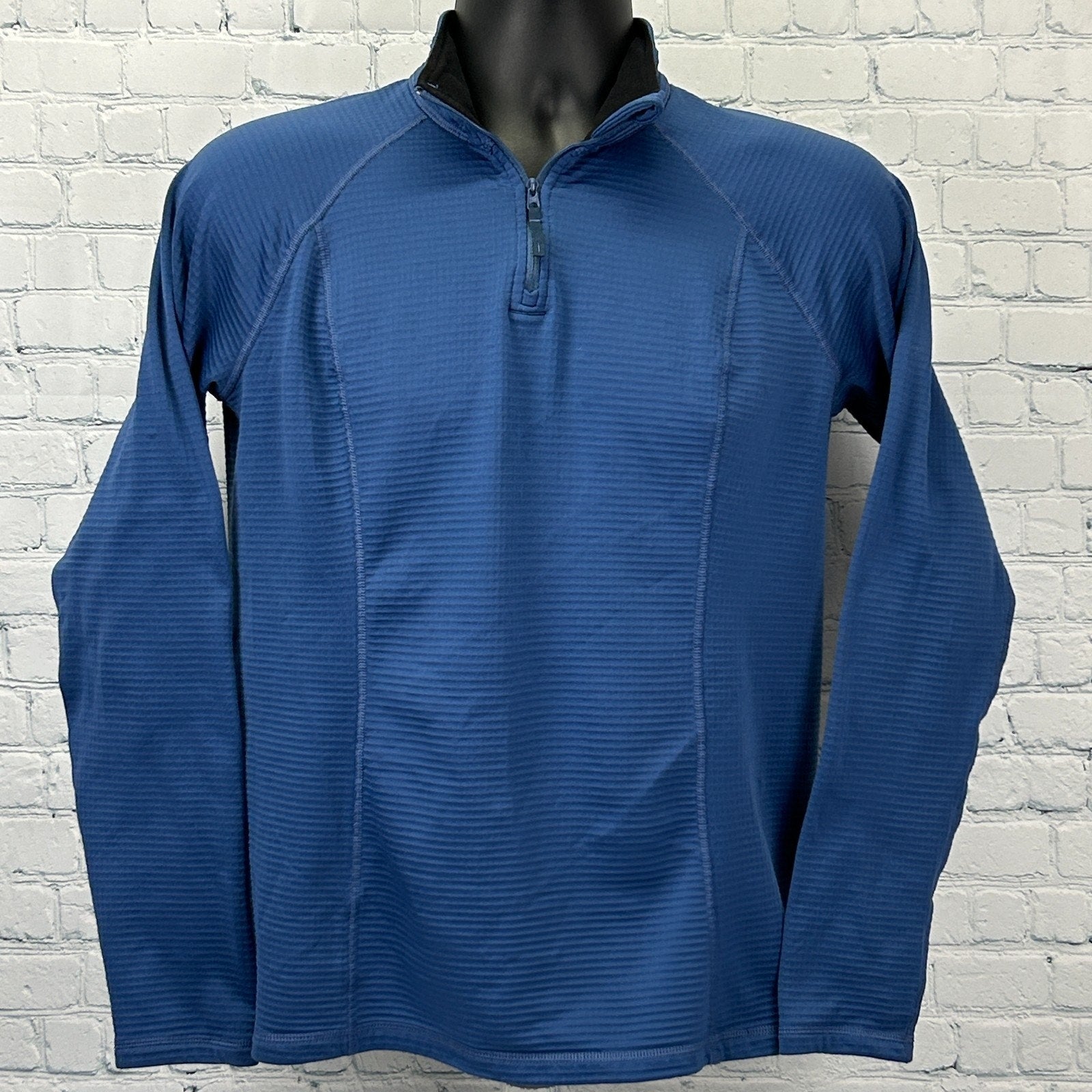 5.11 Tactical Shirt in navy blue, long sleeve, front view with quarter zip and textured fabric