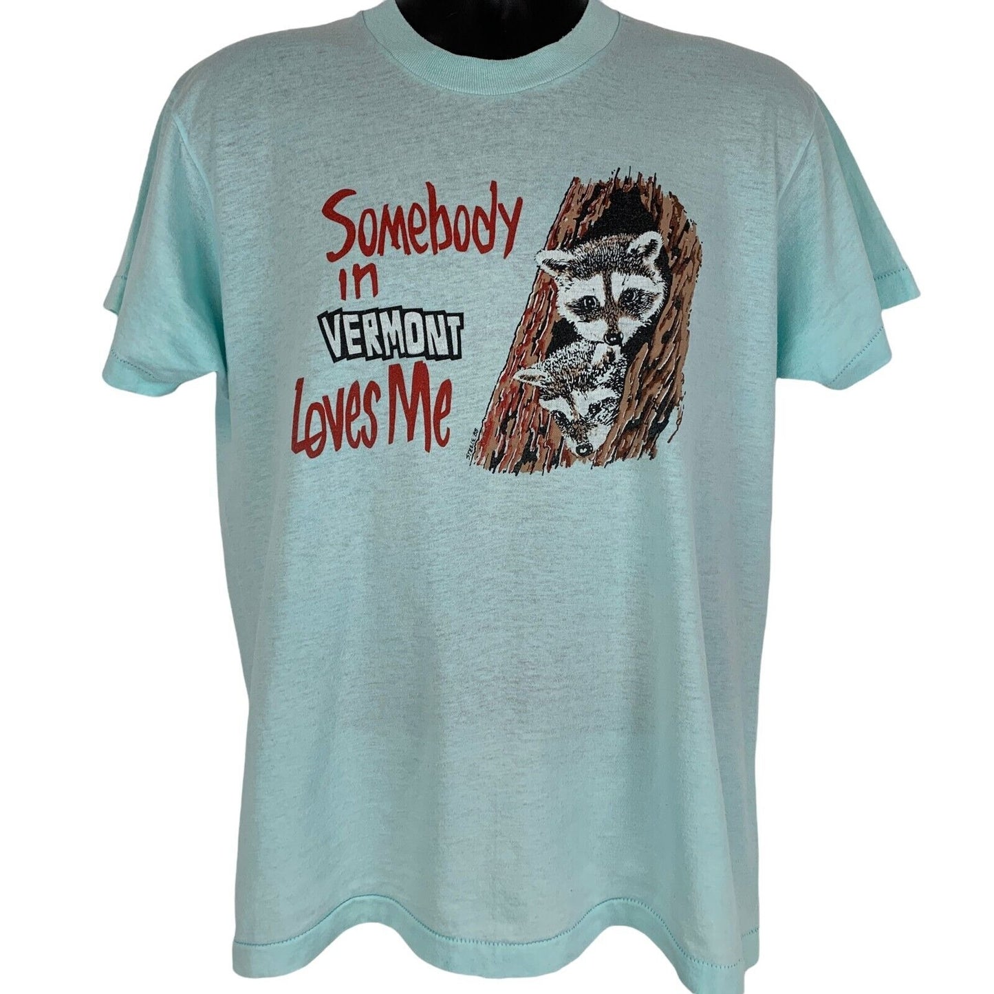 Camiseta vintage de mapaches de los años 80 con texto "Somebody In Vermont Loves Me" para hombre, color azul