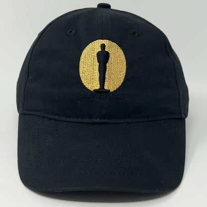 Black baseball cap featuring Academy Awards logo in gold embroidery on the front
