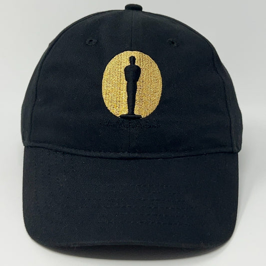 Black baseball cap featuring Academy Awards logo in gold embroidery on the front