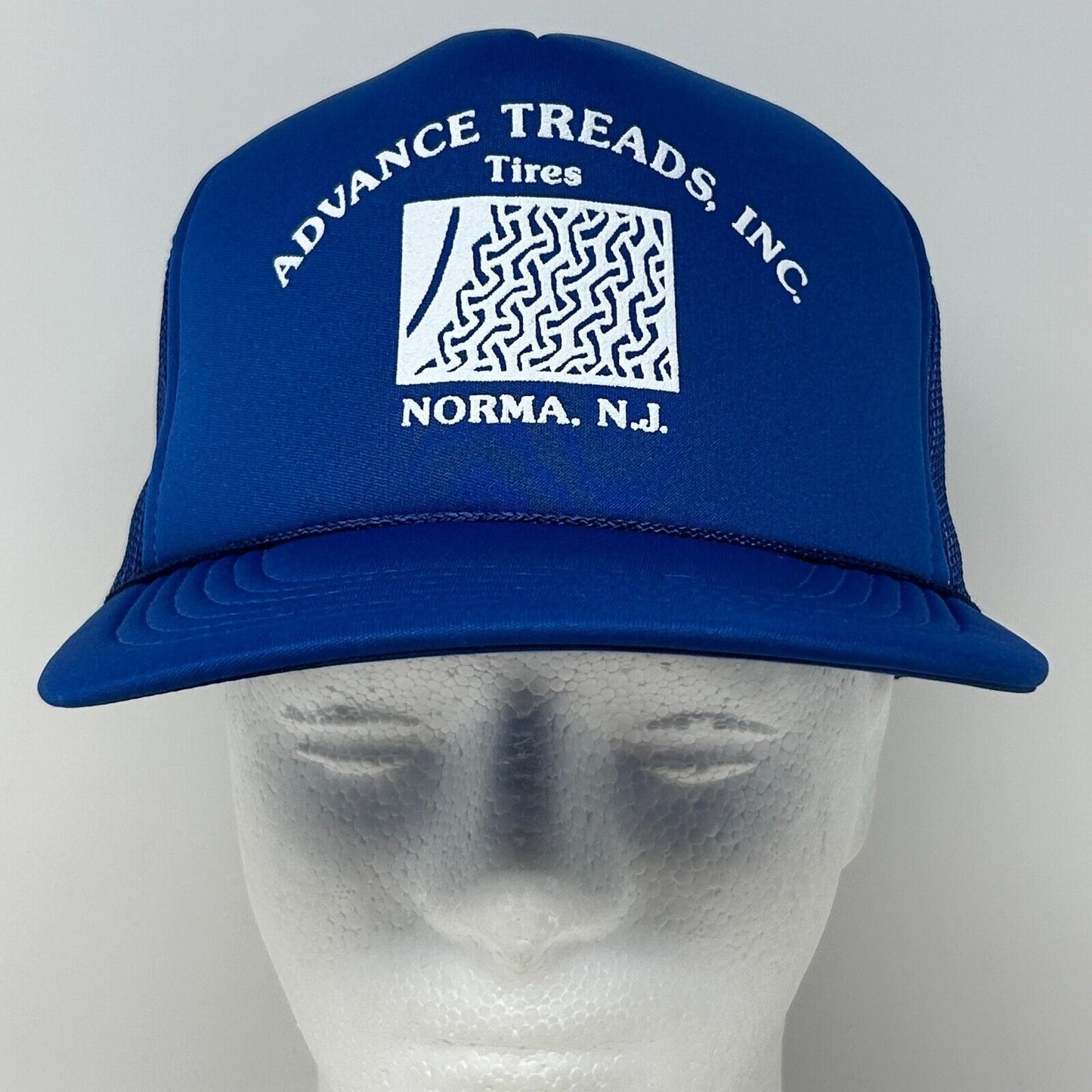 Blue Vintage Cap featuring ADVANCE TREADS TIRES logo, front view, ideal for tire enthusiasts