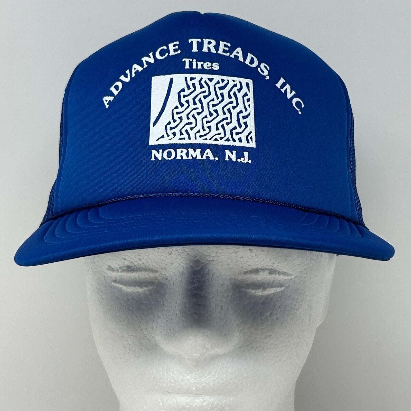 Blue Vintage Cap featuring ADVANCE TREADS TIRES logo, front view, ideal for tire enthusiasts