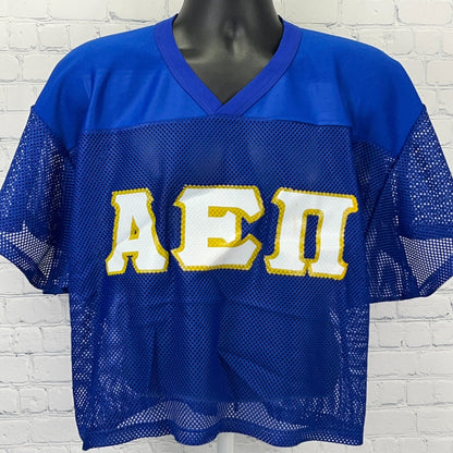 Russell Athletic blue AEPi mesh jersey featuring large yellow logo on front, short sleeves and loose fit