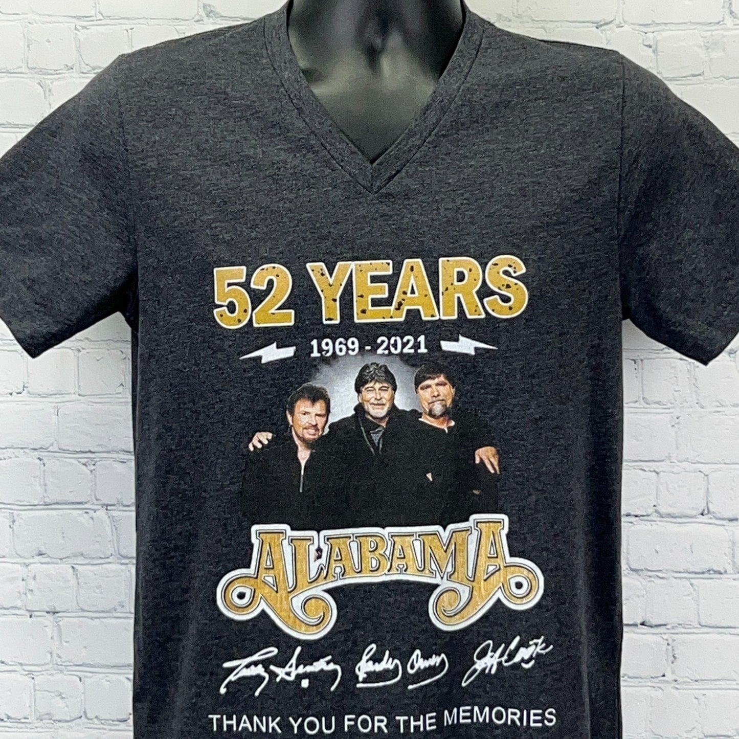 Front view of Alabama Band graphic tee in dark grey featuring 52 years anniversary design and signatures