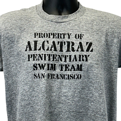 Gray Vintage T-Shirt featuring 'Property of Alcatraz Penitentiary Swim Team' text in bold, front view