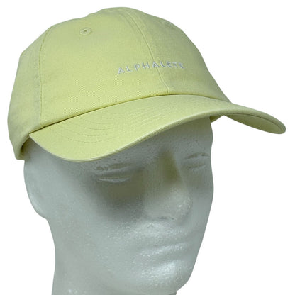 Front view of a light yellow Alphalete Athletics cap with embroidered logo on the front