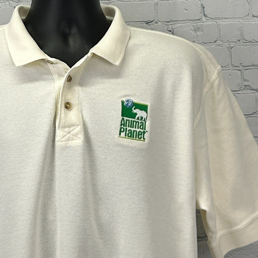 Cream Animal Planet Polo Shirt featuring embroidered logo on chest in a front view