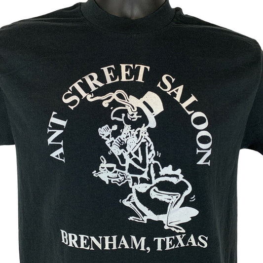 Black Tee Jays T-shirt featuring Ant Street Saloon graphic, size medium with Brenham Texas design on the front