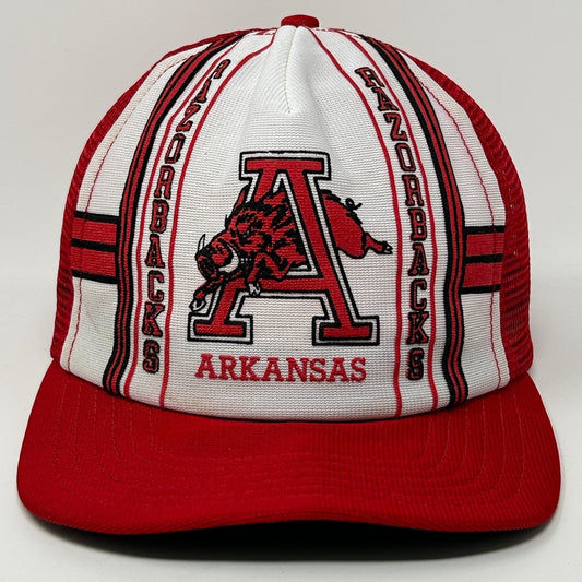 Front view of a red and white Arkansas Razorbacks Hat with logo and bold stripe design