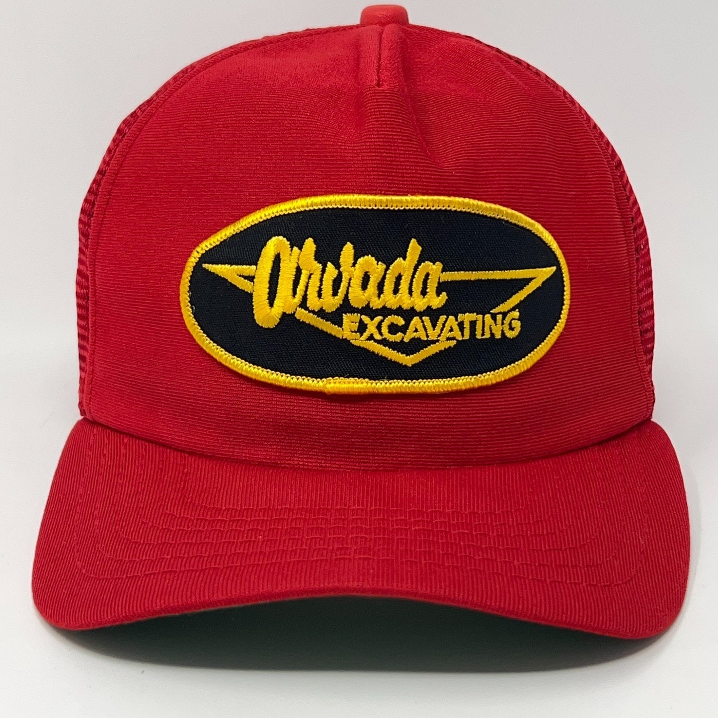 Red New Era Arvada Excavating Cap with Yellow and Black Logo on Front View