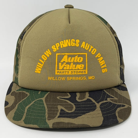 Vintage Trucker Hat in camo design with yellow Auto Value logo on front view