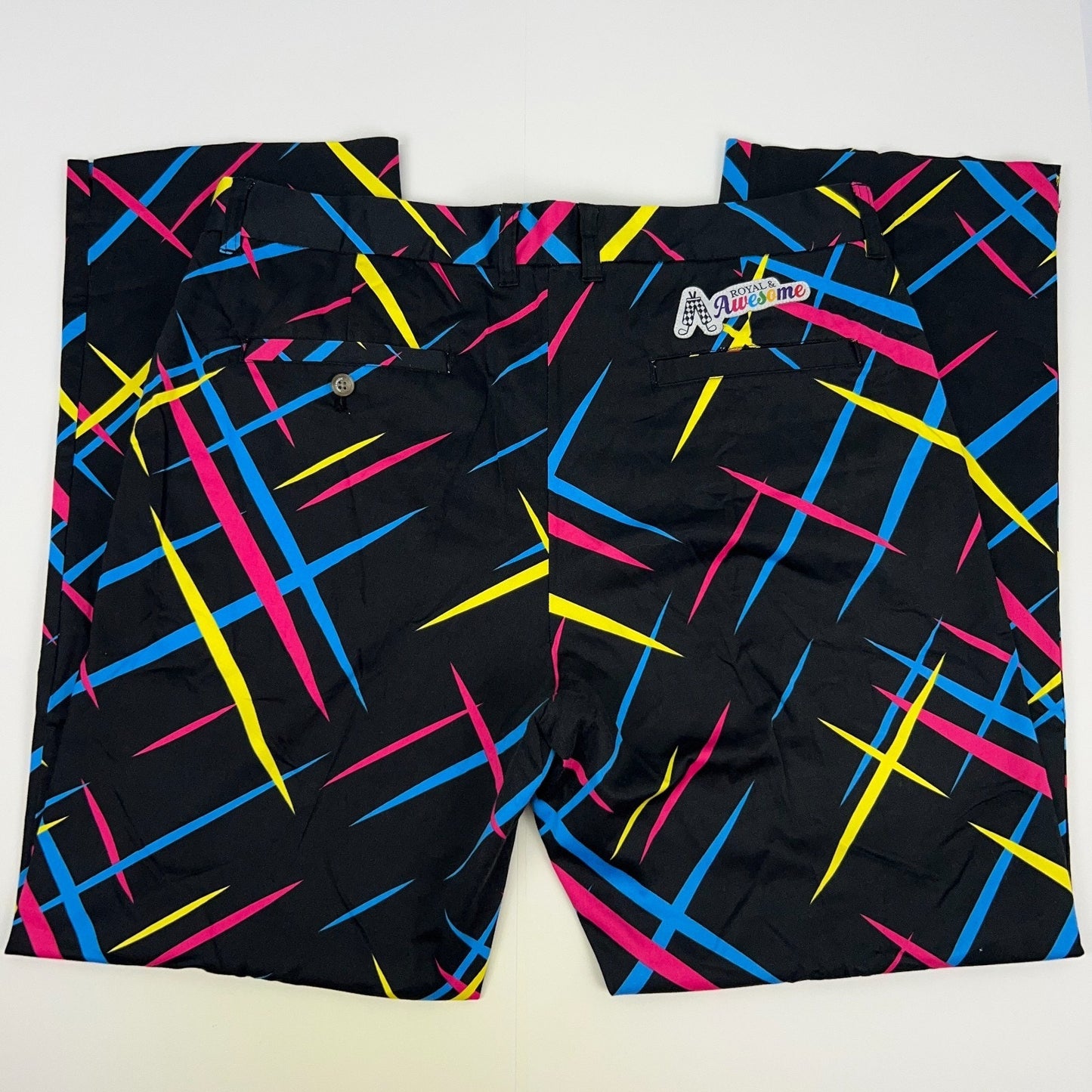 Back view of Royal & Awesome colorful Golf Pants in black with blue, pink, and yellow patterns