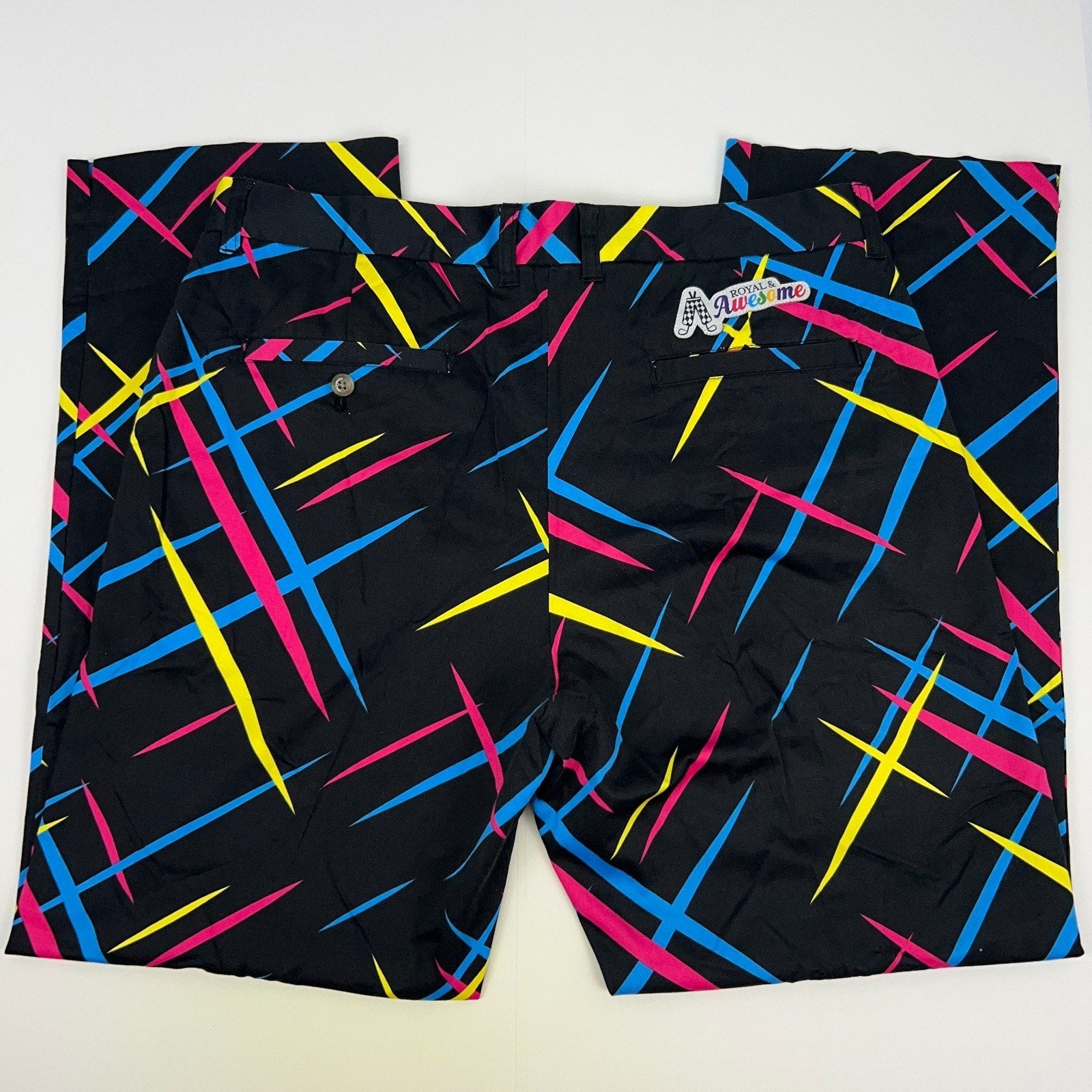 Back view of Royal & Awesome colorful Golf Pants in black with blue, pink, and yellow patterns