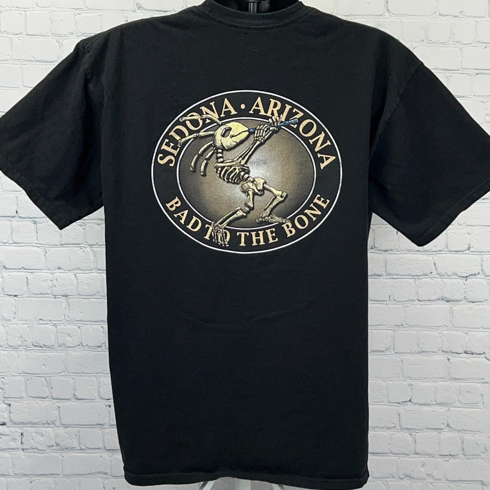 Black Sedona Arizona T-shirt featuring a skeleton graphic with 'Bad to the Bone' text