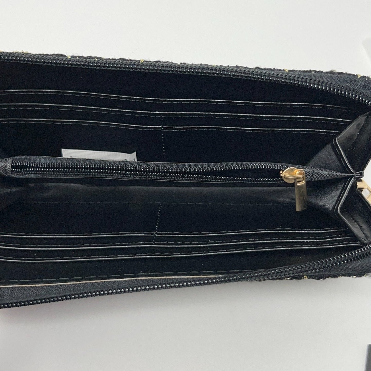 Badgley Mischka leather crossbody mini bag in black, interior view showing compartments