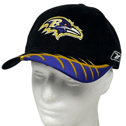 Black Reebok Baltimore Ravens hat with yellow and purple logo embroidered on the front and bill detail
