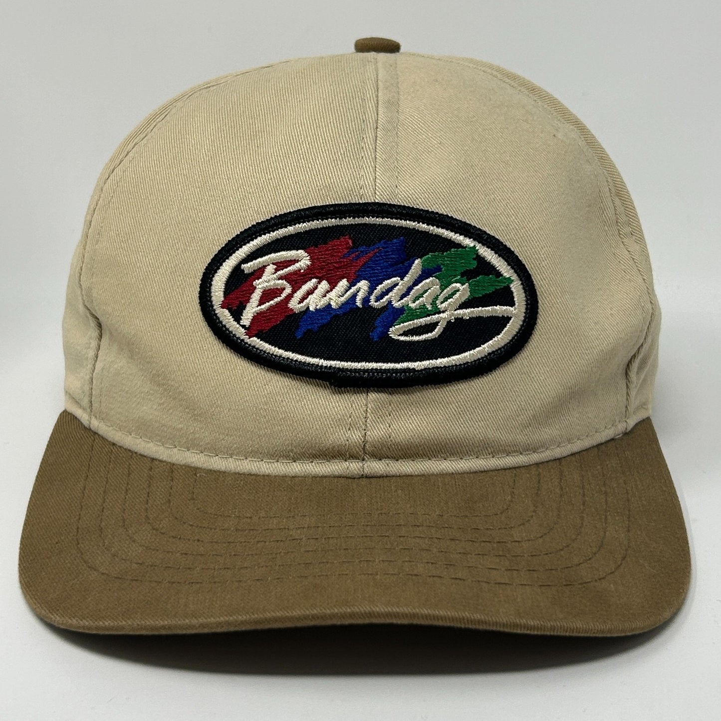 Beige Swingster Baseball Hat with Front Logo Patch and Brown Brim for Casual Style
