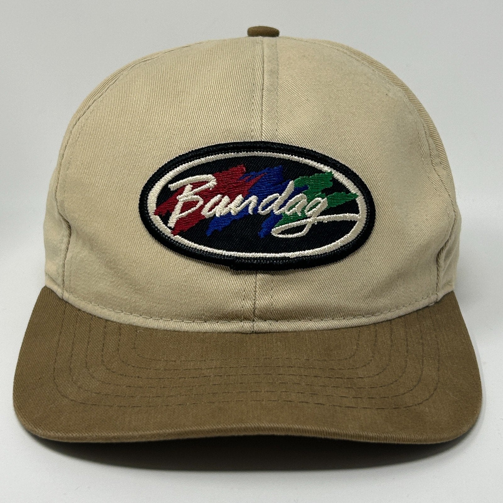 Beige Swingster Baseball Hat with Front Logo Patch and Brown Brim for Casual Style