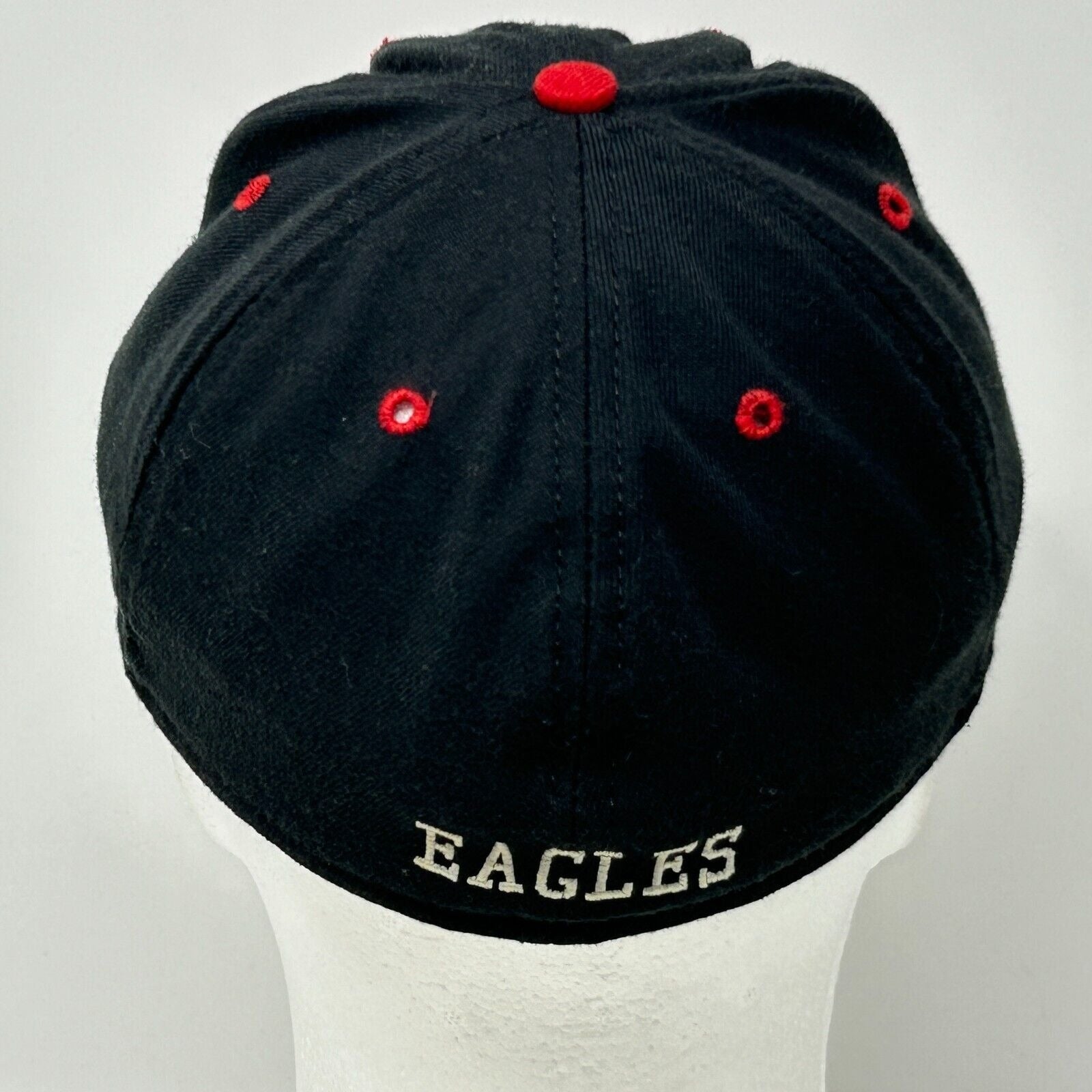 New Era baseball hat in black with red accents, vintage style, back view
