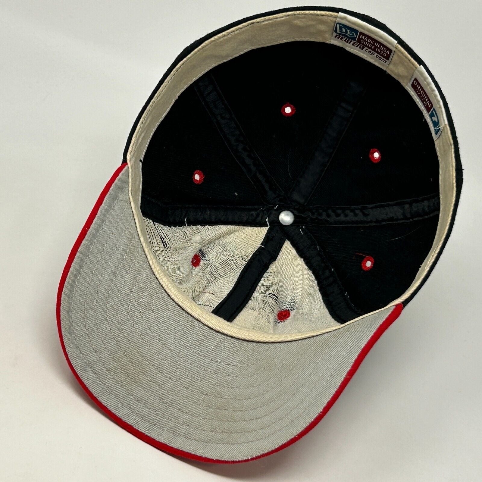 New Era baseball hat in black and red, size medium, front view, vintage style