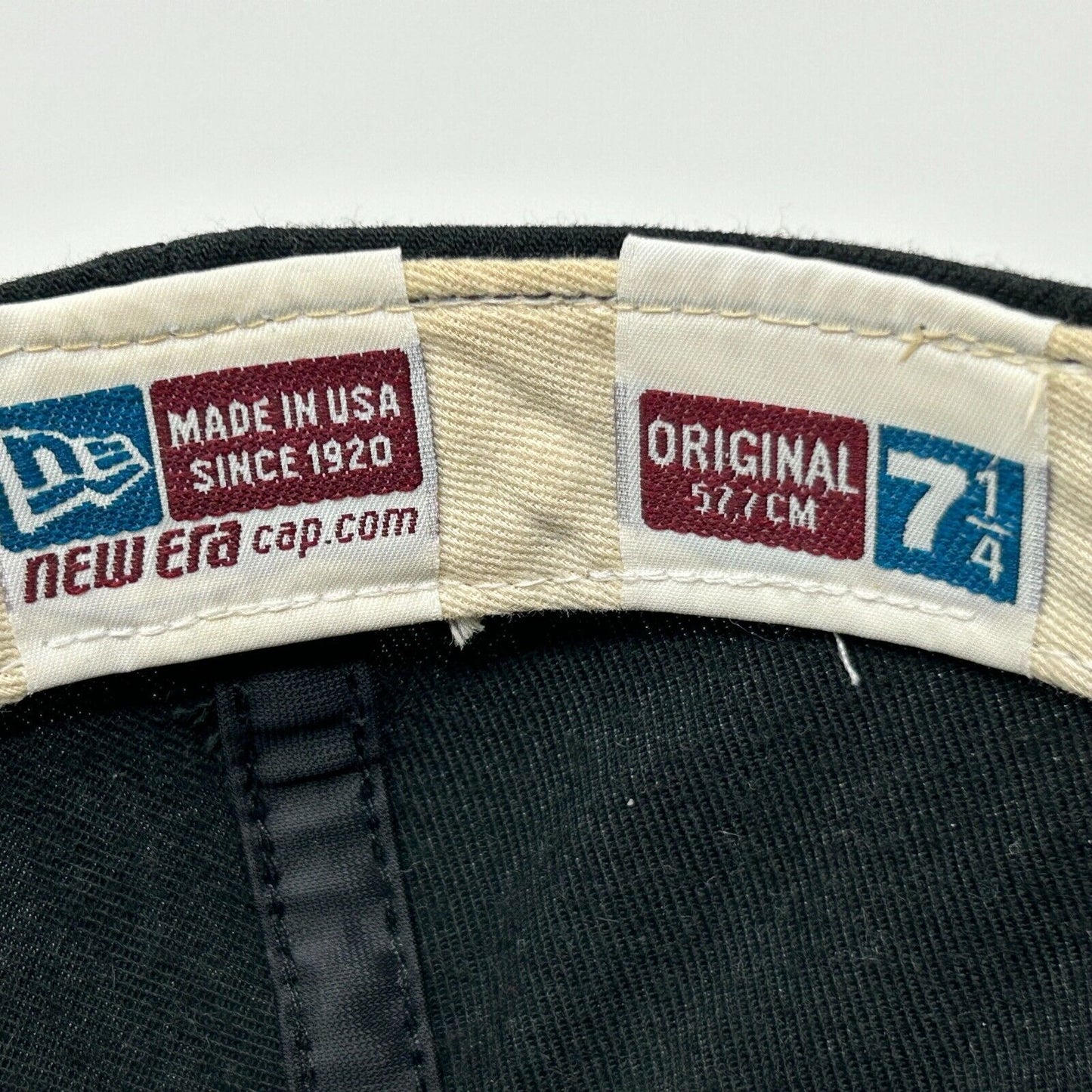 New Era baseball hat 7 1/4 vintage view from inside showing size label and origin details