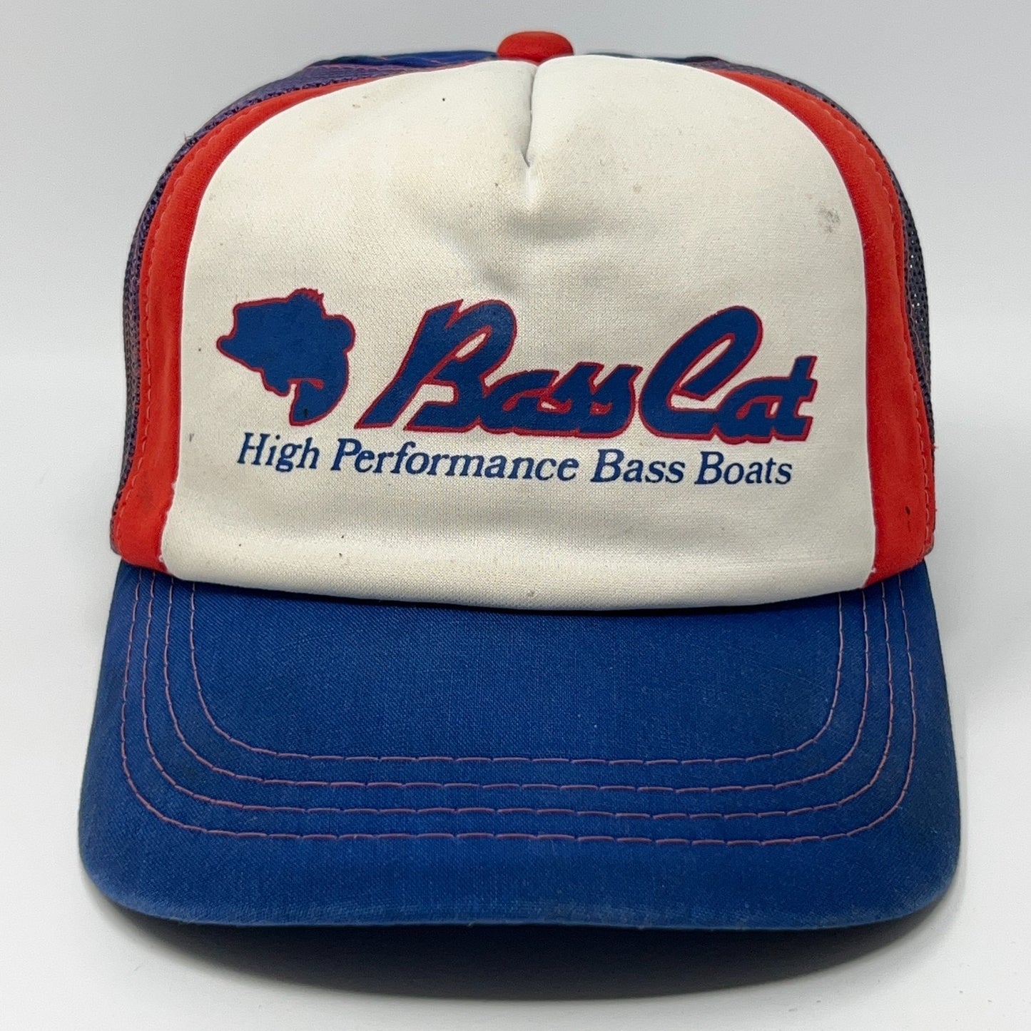 Front view of a Vintage Fishing Hat in red, white, and blue with Bass Cat logo and details