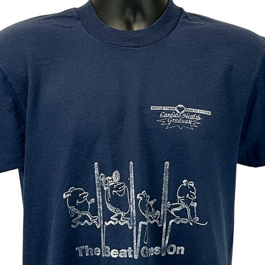 Navy blue Screen Stars T-Shirt with front logo 'Battle Creek Health System' and artistic graphic design
