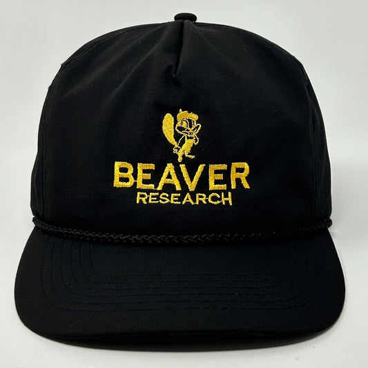 Front view of a black Vintage Hat featuring Beaver Research logo in yellow embroidery and a braided strap