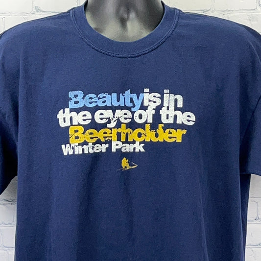 Navy Gildan T-Shirt featuring 'Beauty is in the eye of the Beerholder' text, size medium, front view, Winter Park Colorado design