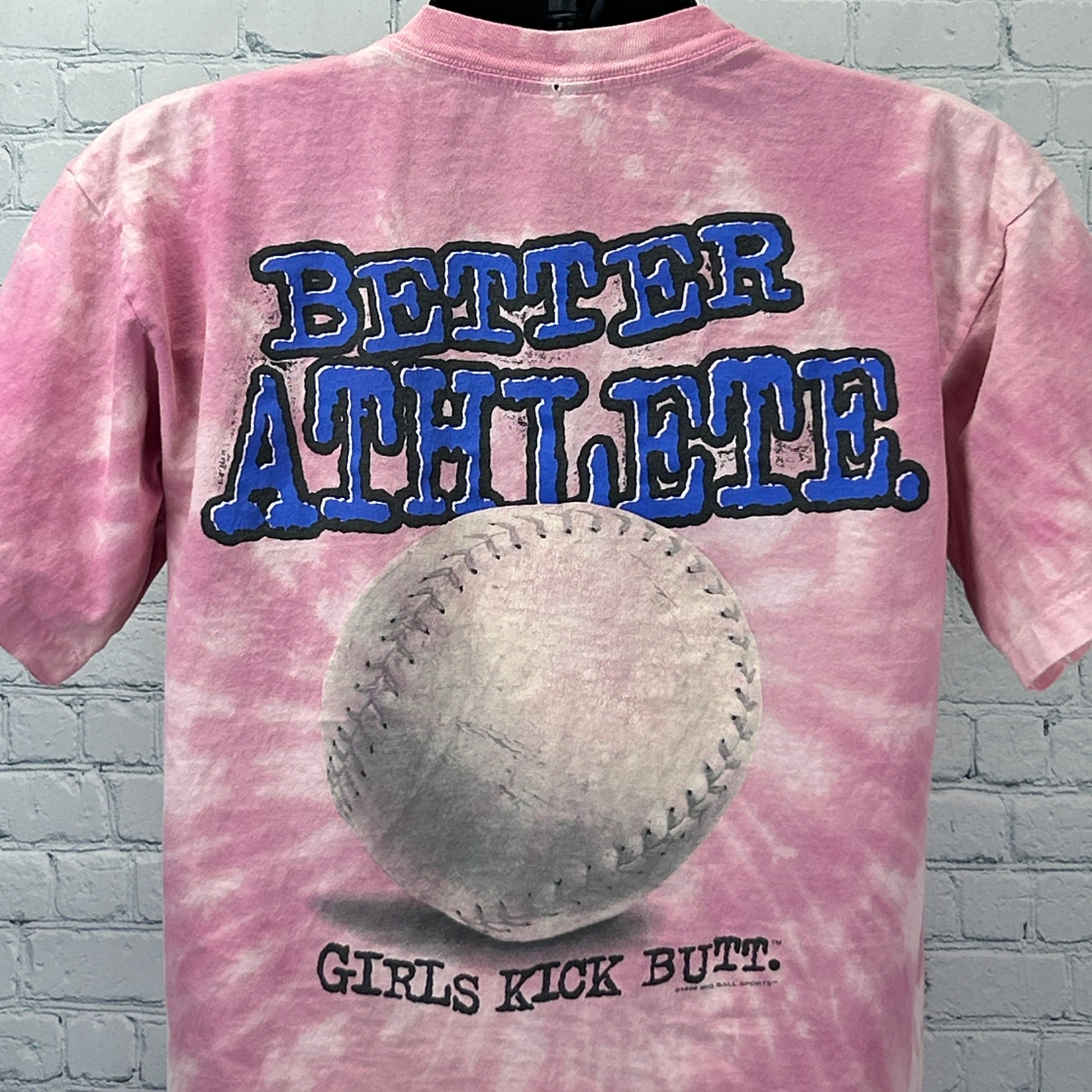 Pink tie-dye T-Shirt from Big Ball Sports with 'Better Athlete' and softball design on the back