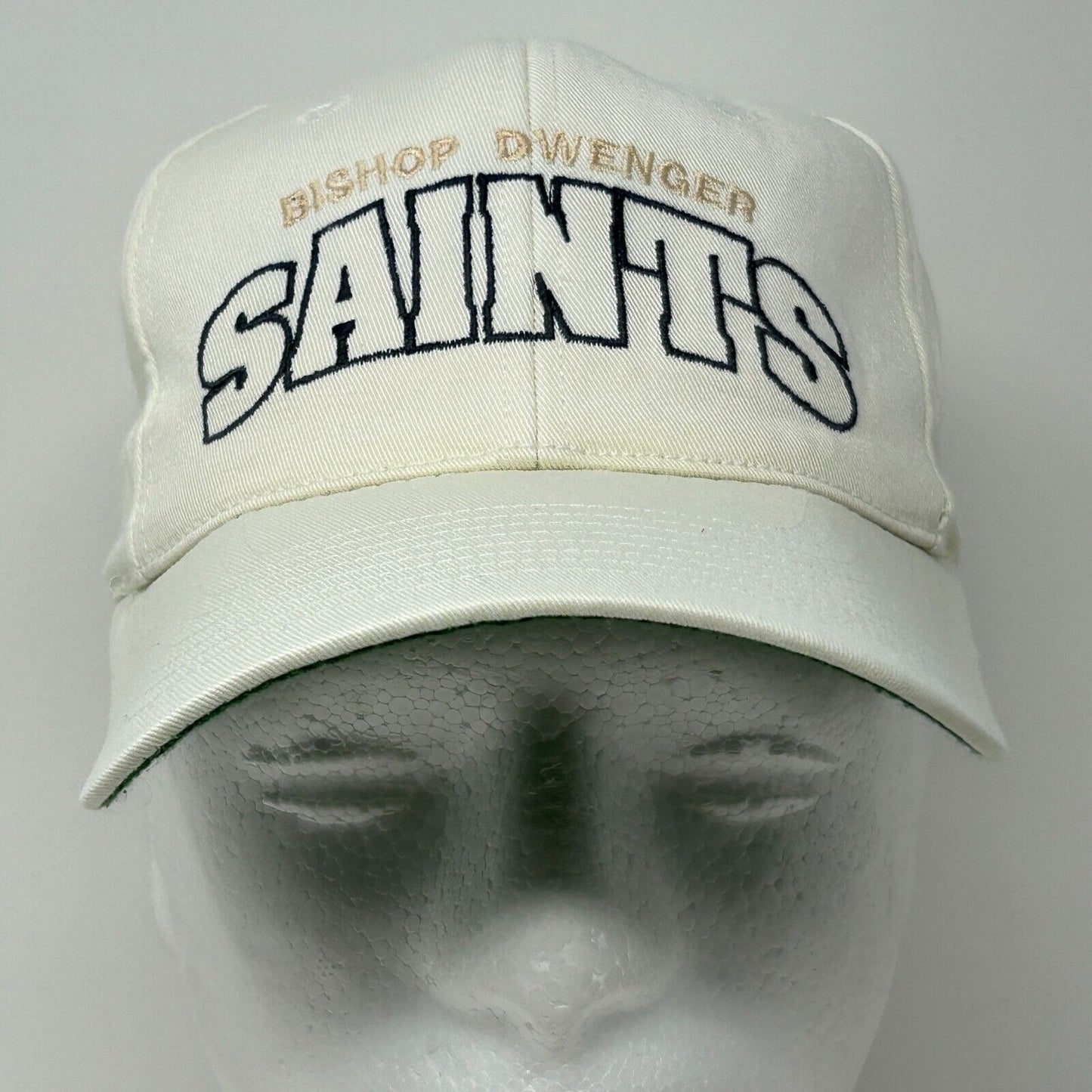White Bishop Dwenger baseball cap with 'Saints' logo in bold lettering on the front.