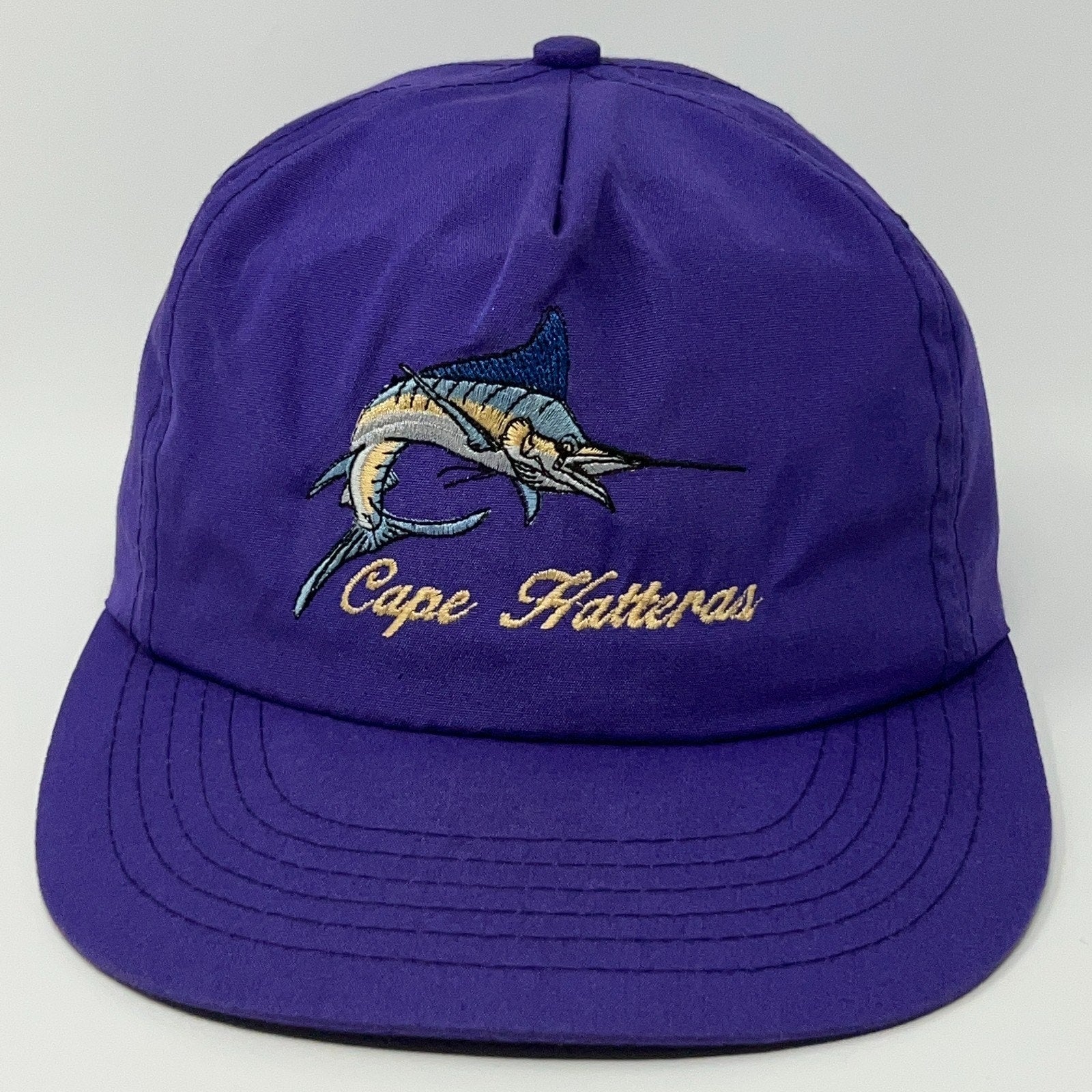 Purple Cape Hatteras Hat featuring embroidered marlin design and text on the front view