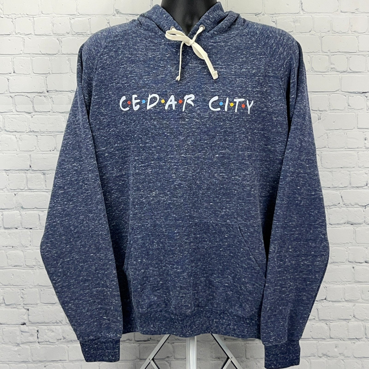 Navy blue Cedar City Utah hoodie with colorful logo, front view, perfect for casual wear