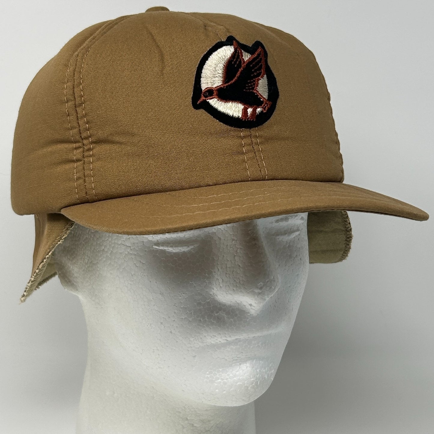 Vintage Duck Hunting Hat in tan with embroidered duck logo, featuring a front view for detailed inspection