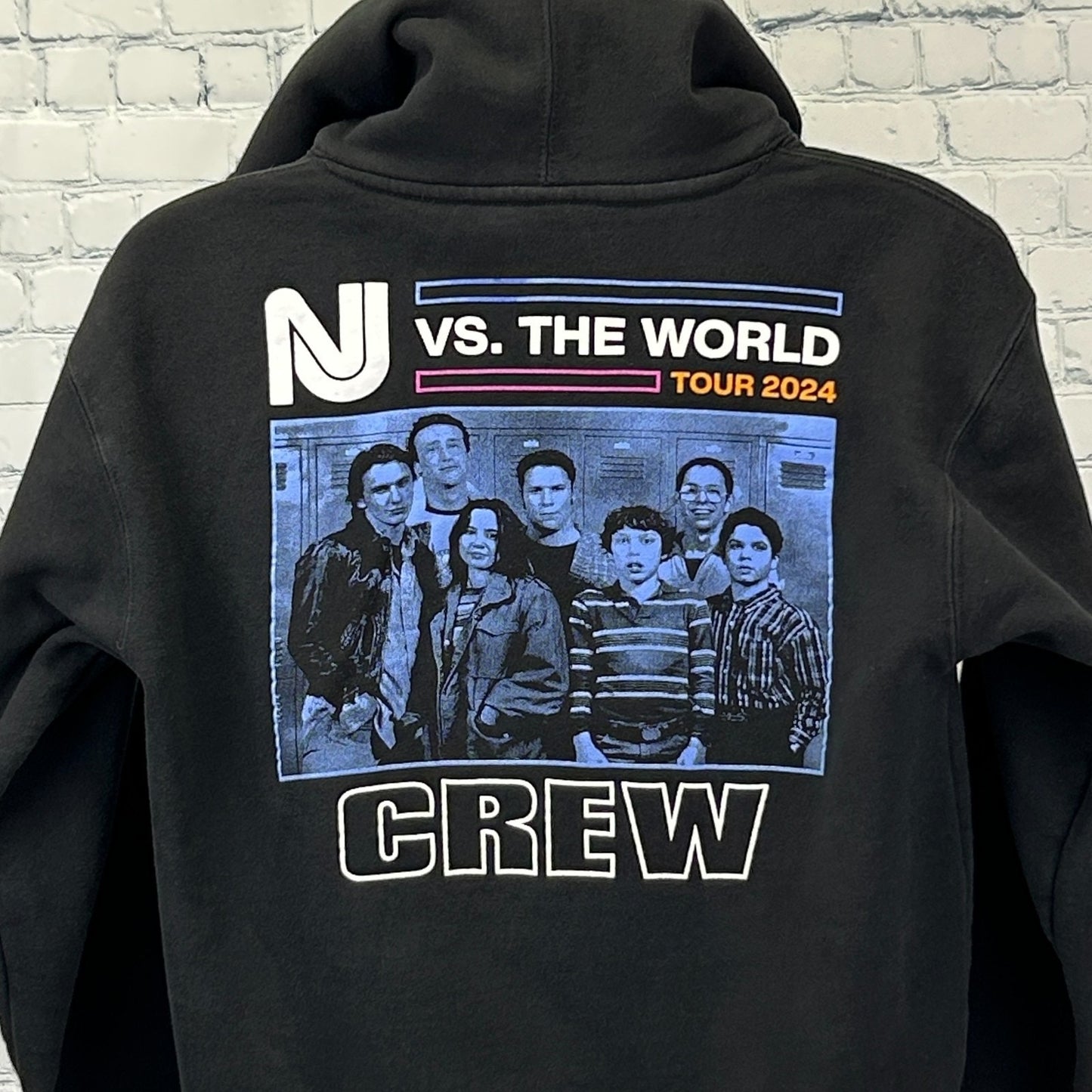Black EMO Hoodie featuring colorful NJ vs. The World Tour 2024 graphic and crew members on the back