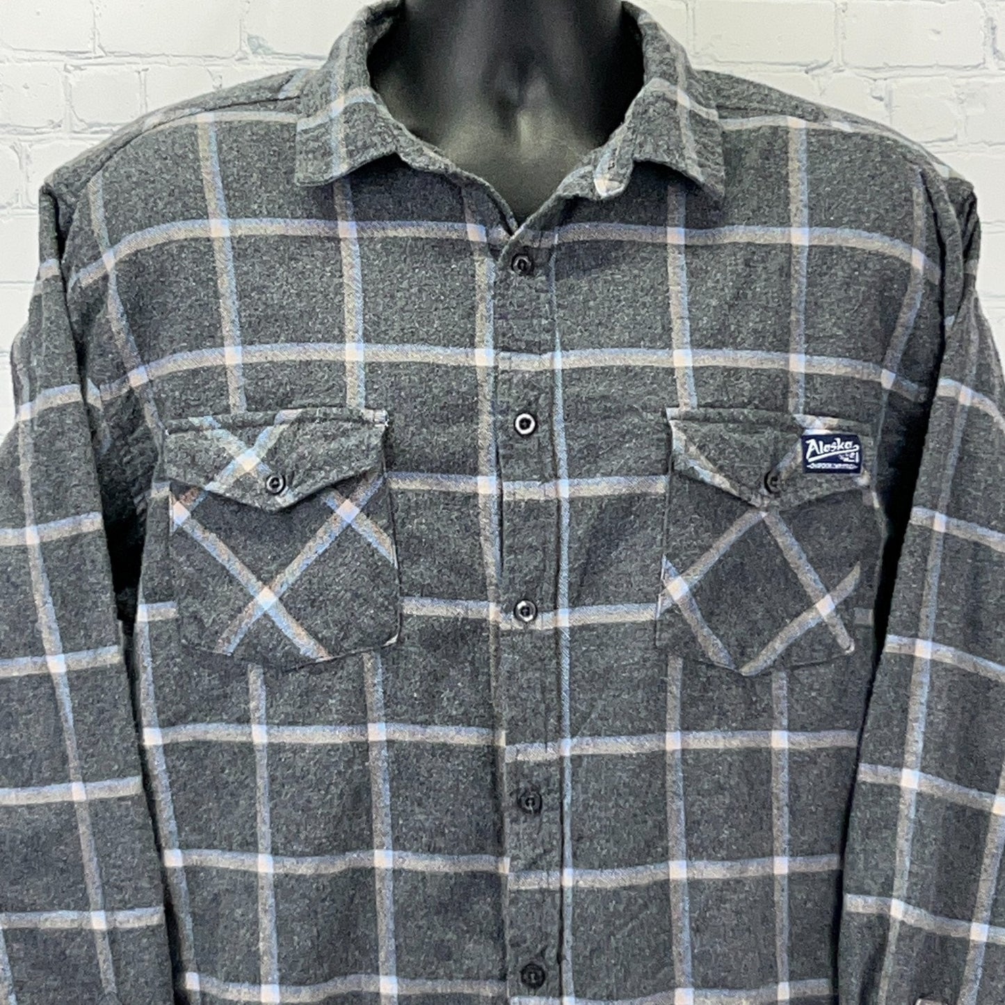 Men's gray flannel shirt with plaid pattern, featuring front pockets and ACE USA logo detail