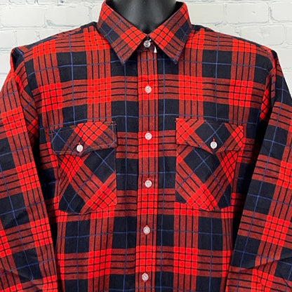 Vintage red and black checkered flannel shirt with button-up front and two chest pockets