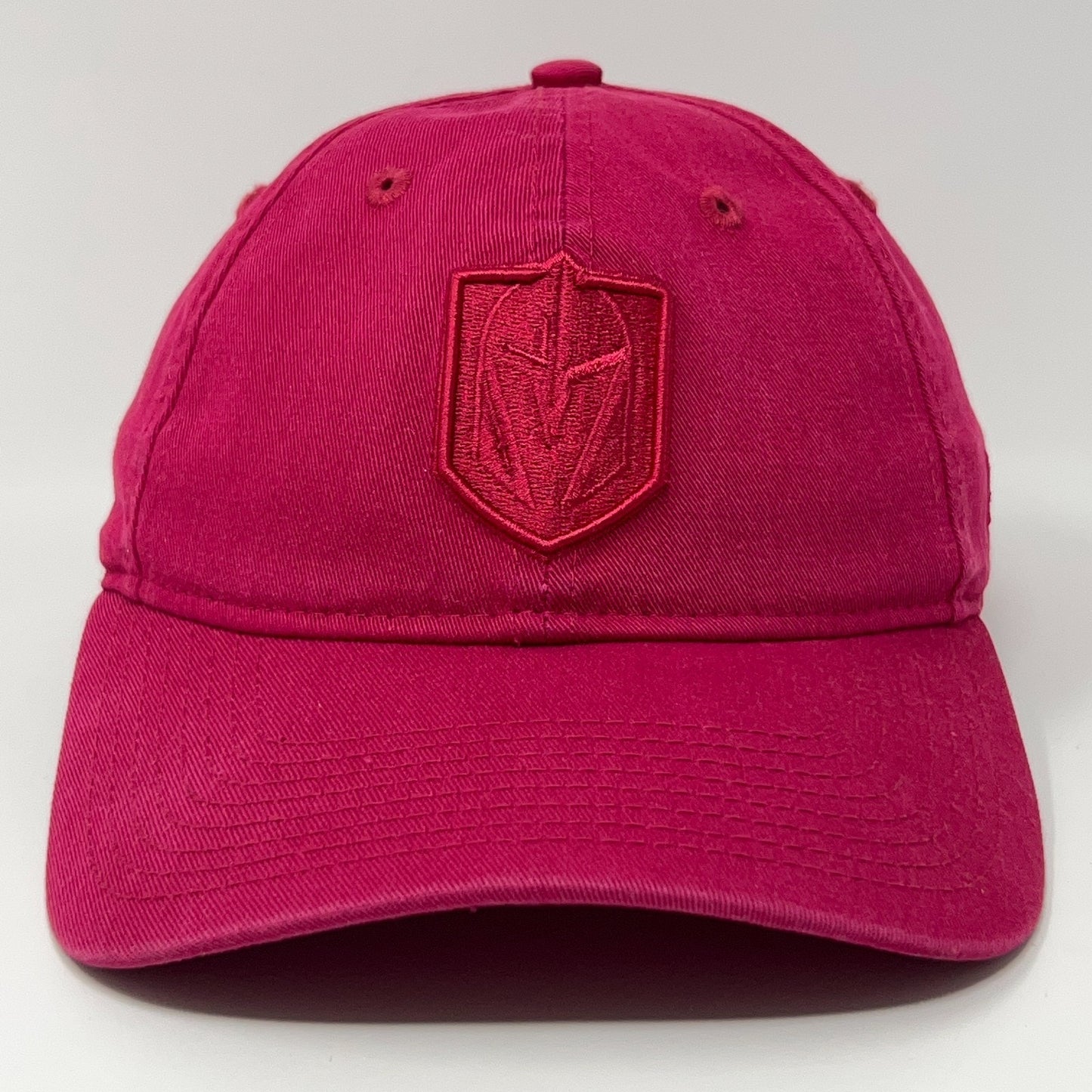 Front view of a pink New Era cap with a Golden Knights logo embroidered in red