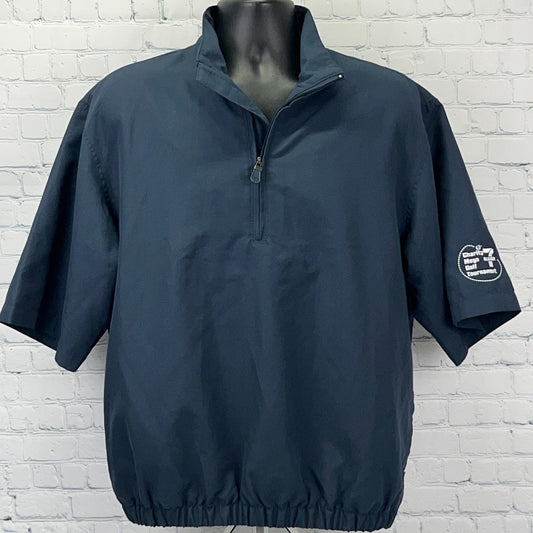 Vintage navy blue Golf pullover with half zip and short sleeves, featuring a logo on the sleeve